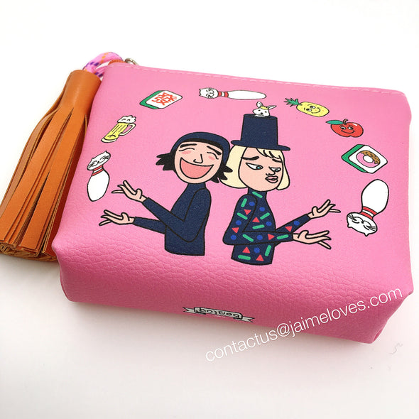 Pink with orange tassel